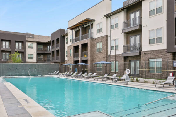 Outdoor pool Spaces with lounge chairs